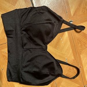 Black crop top, scrunched in the back.